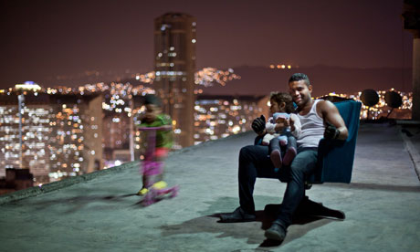 The 'vertical slum' ... Torre David in Caracas is a 45-storey tower block that houses some 2,500 squatters. Photograph: Iwan Baan/Urban-Think Tank