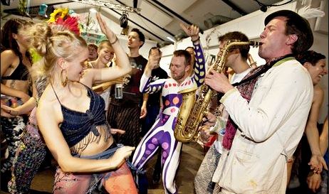 Dancers get in the groove while Guido Spannocchi plays saxophone - at the Morning Gloryville rave in Bethnal Green - London. Photograph Karen Robinson For The Observer